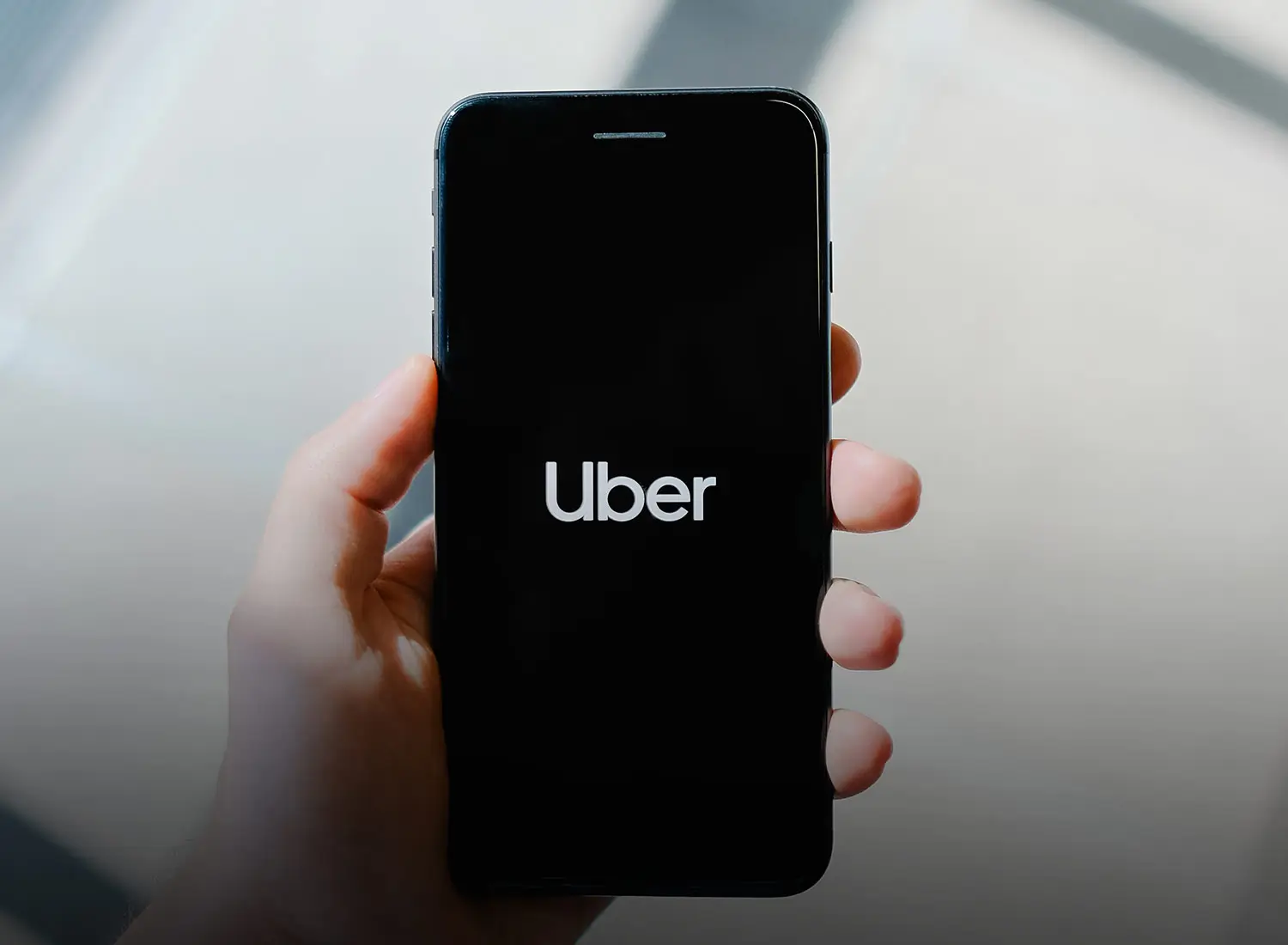 Uber - holding phone